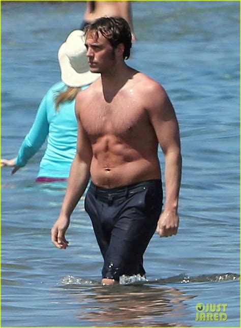 laura haddock sexy|Hunger Games Sam Claflin admires bikini